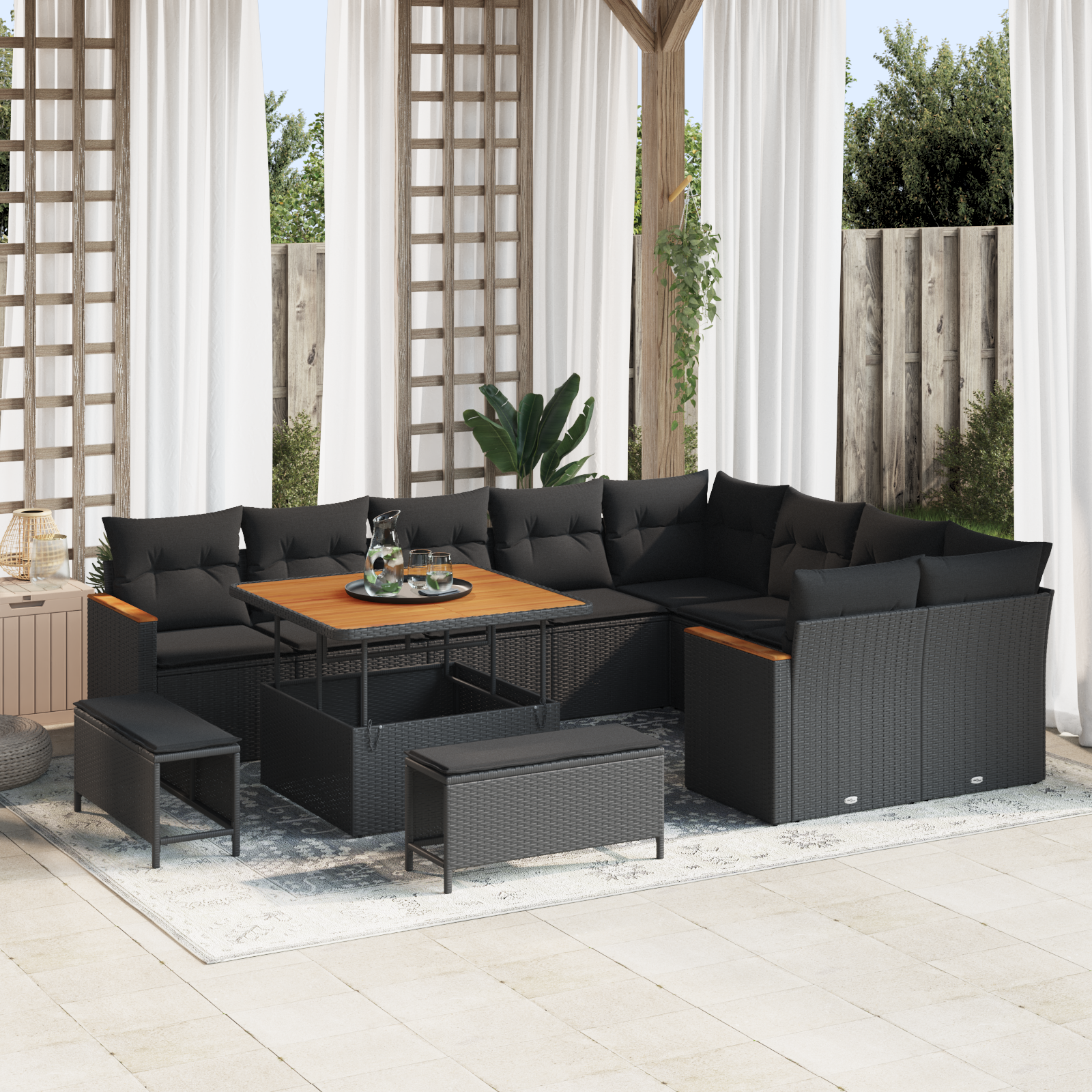 Trädgårdsoffset med kudde med lagring 12 pcs Svart Poly Rattan