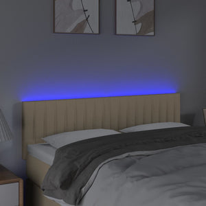 Sänggavel LED gräddvit 144x5x78/88 cm tyg