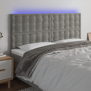 Sänggavel LED ljusgrå 160x5x118/128 cm sammet