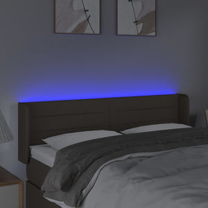 Sänggavel LED taupe 147x16x78/88 cm tyg