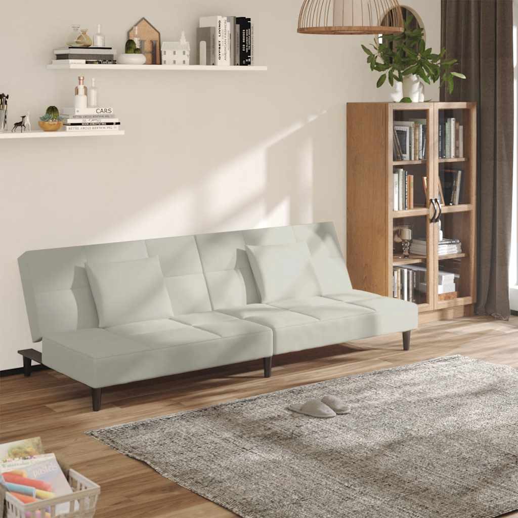 Bäddsoffa 2-sits med två kuddar gräddvit sammet