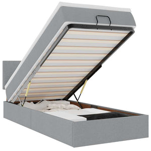 Ottomansk säng med madrass och LED-lampor ljusgrå 90x200 cm tyg