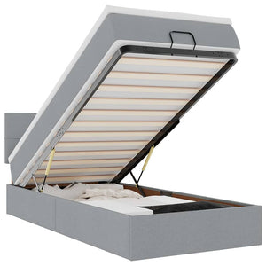 Ottomansk säng med madrass och LED-lampor ljusgrå 90x200 cm tyg