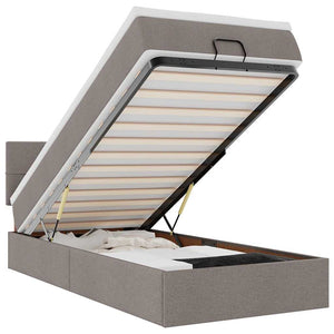 Ottomansk säng med madrass och LED-lampor taupe 90x200 cm tyg