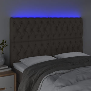 Sänggavel LED taupe 144x7x118/128 cm tyg