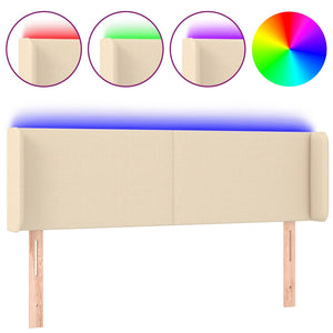 Sänggavel LED gräddvit 147x16x78/88 cm tyg