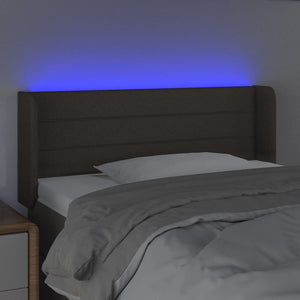 Sänggavel LED taupe 103x16x78/88 cm tyg