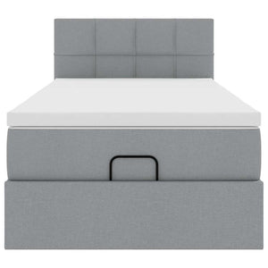 Ottomansk säng med madrass och LED-lampor ljusgrå 90x200 cm tyg