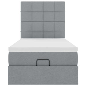 Ottomansk säng med madrass och LED-lampor ljusgrå 90x200 cm tyg