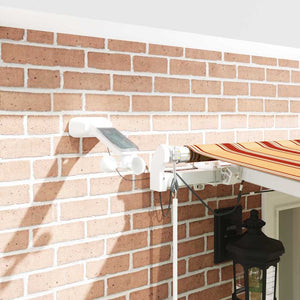 Utfällbar markis med LED -remsljus Gul och Orange 600 × 300 cm